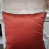 Cuscino ruggine con livetto turchese 50x50